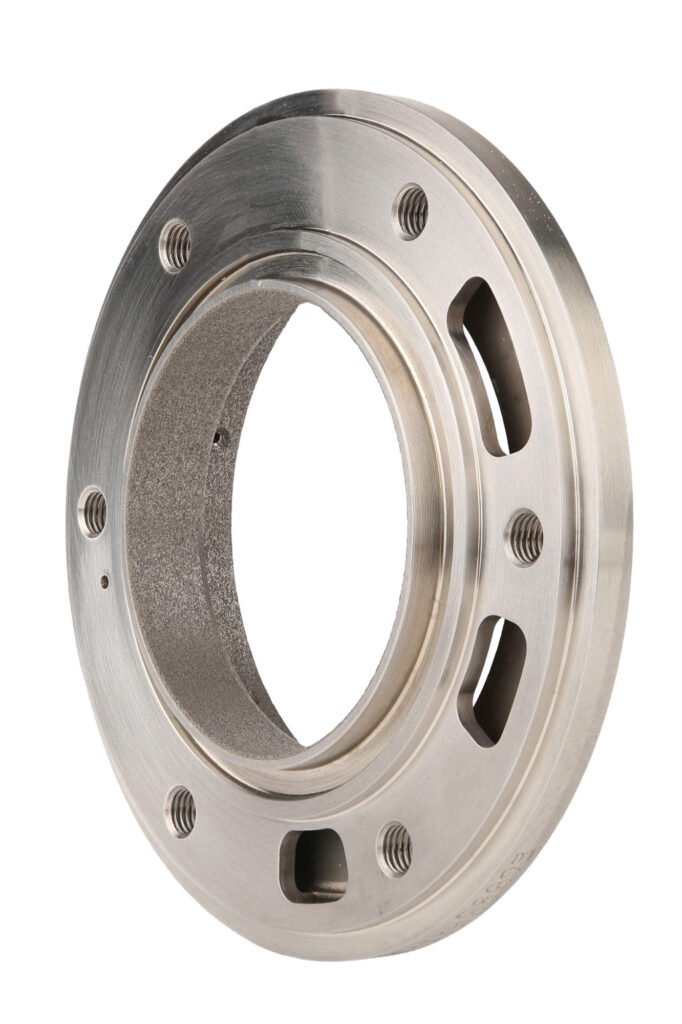 Machined metal ring with elongated openings