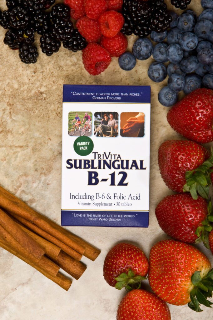 Vitamin B-12 packaging surrounded by berries and cinnamon